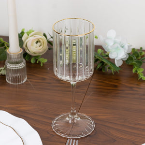 Elegant crystal glass with gold rim, perfect for special occasions.