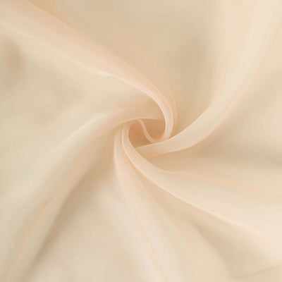 Light peach sheer fabric with soft texture and flowing drape. #whtbkgd