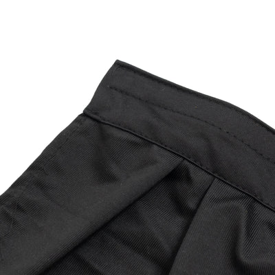 Close-up of black ribbed knit waistband on pants#whtbkgd
