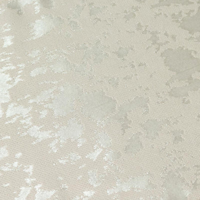 Close-up of cream floral jacquard fabric texture
