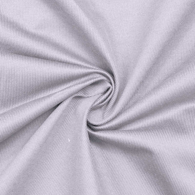 Close-up of light gray ribbed fabric with soft twisted folds