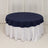 Navy blue tablecloth with white underskirt on a round table