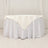 White tablecloth with elegant draping for event decor