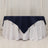 Navy tablecloth draped elegantly over a white table.