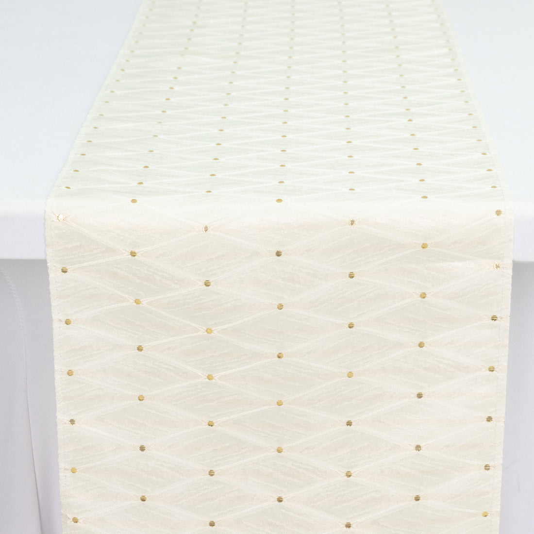Cream textured tie with gold polka dot pattern
