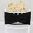 Black chair sash with ruched detail, elegantly draped over a white chair.