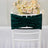 Emerald green chair cover with ruching design against a plain background.