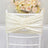 Ivory chair sash with gathered design against a white backdrop