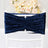 Navy velvet chair sash with pleated design on a white chair.