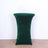 Green velvet table cover on a round table against a white background.
