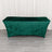 Green velvet table cover on a plain backdrop.