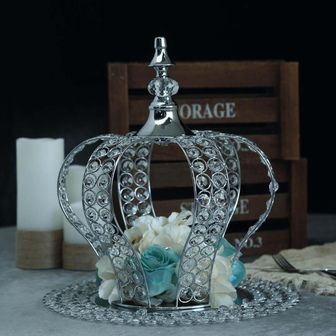 Silver crown centerpiece with flowers, decorative home accent.