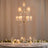 Elegant crystal chandelier centerpiece on a beautifully set dining table.
