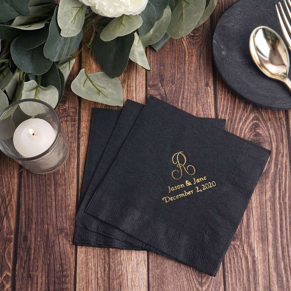 Personalized black napkins with gold lettering for Jason & Jane's event.