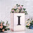 Decorative floral arrangement in a mirrored box with an 'I' design.