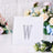 Rhinestone letter "W" on a white background with floral decor.