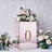 Decorative pink floral arrangement in a mirrored box with the number "0".