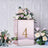 Elegant floral arrangement in a mirrored box with the number 4.