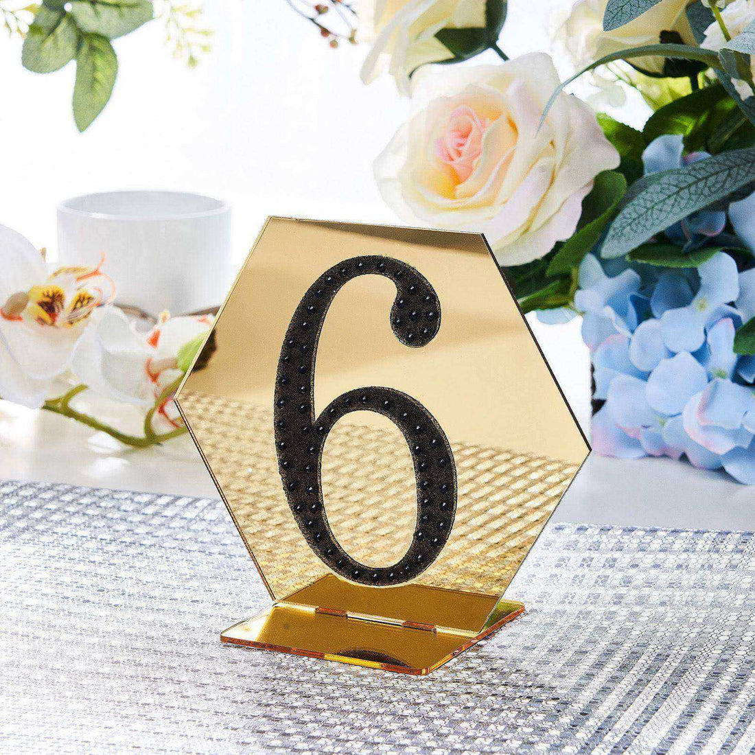 Gold hexagon table number sign with black rhinestones, number 6.