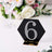 Black hexagon table number 6 with rhinestones for elegant events.