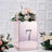 Rose gold number 7 display box with floral arrangement