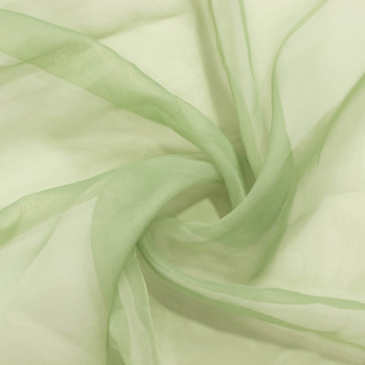 Sheer light green fabric draped elegantly. #whtbkgd
