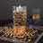 Gold rock candle holder with glittering top and textured base.