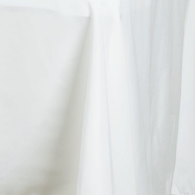 White sheer fabric draped elegantly, showcasing soft texture and light transparency #whtbkgd