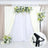 Wedding backdrop with floral arrangements and drapes, featuring a close-up of the support stand.