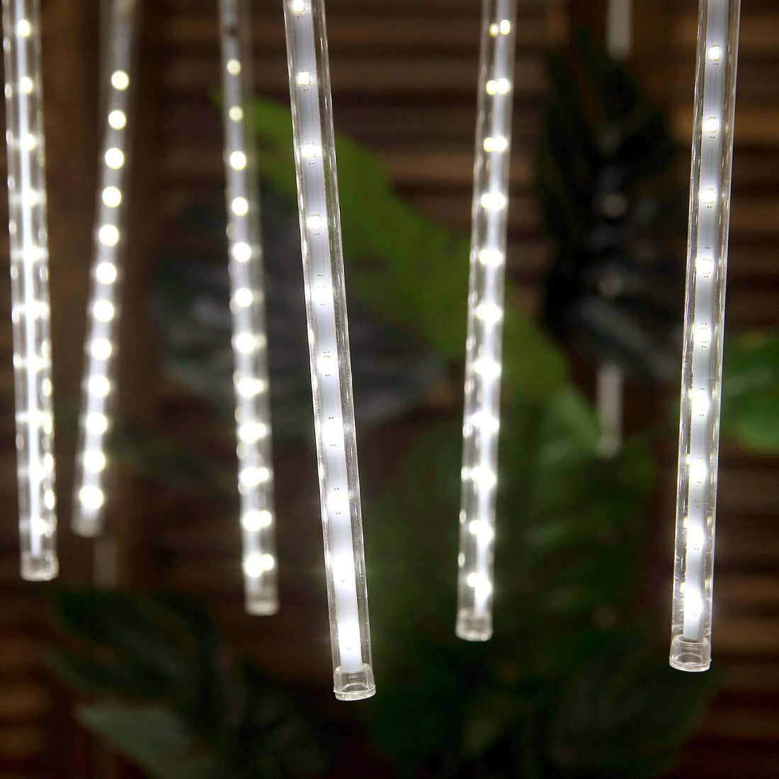 LED pendant lights with clear tubes hanging elegantly.