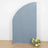 Blue fabric backdrop with floral arrangement in front.