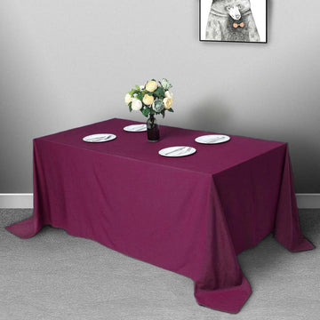 Elevate Your Event Decor with the Eggplant Polyester Rectangular Tablecloth 90"x132"