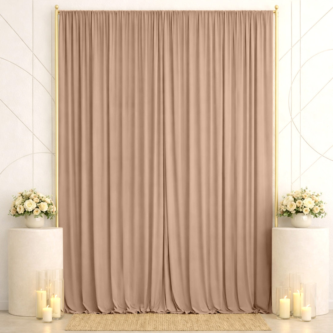 Elegant beige curtain backdrop with floral arrangements and candles