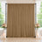 Elegant beige wedding backdrop with floral arrangements and candles