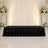 Elegant black banquet table with wedding floral backdrop and draped curtains