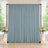 Elegant blue-gray wedding backdrop with floral arrangements and candle decor
