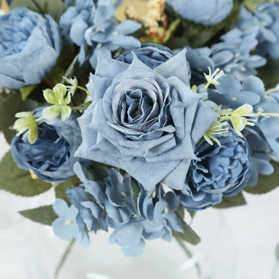 Blue paper flower bouquet featuring roses and blooms.
