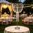 Elegant crystal candle holder centerpiece at a romantic outdoor wedding reception