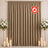 Elegant flame-retardant champagne curtain backdrop with candles and white floral decor