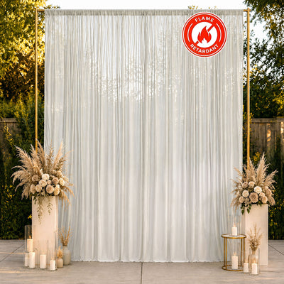 Elegant flame retardant wedding backdrop with white curtains and floral decor