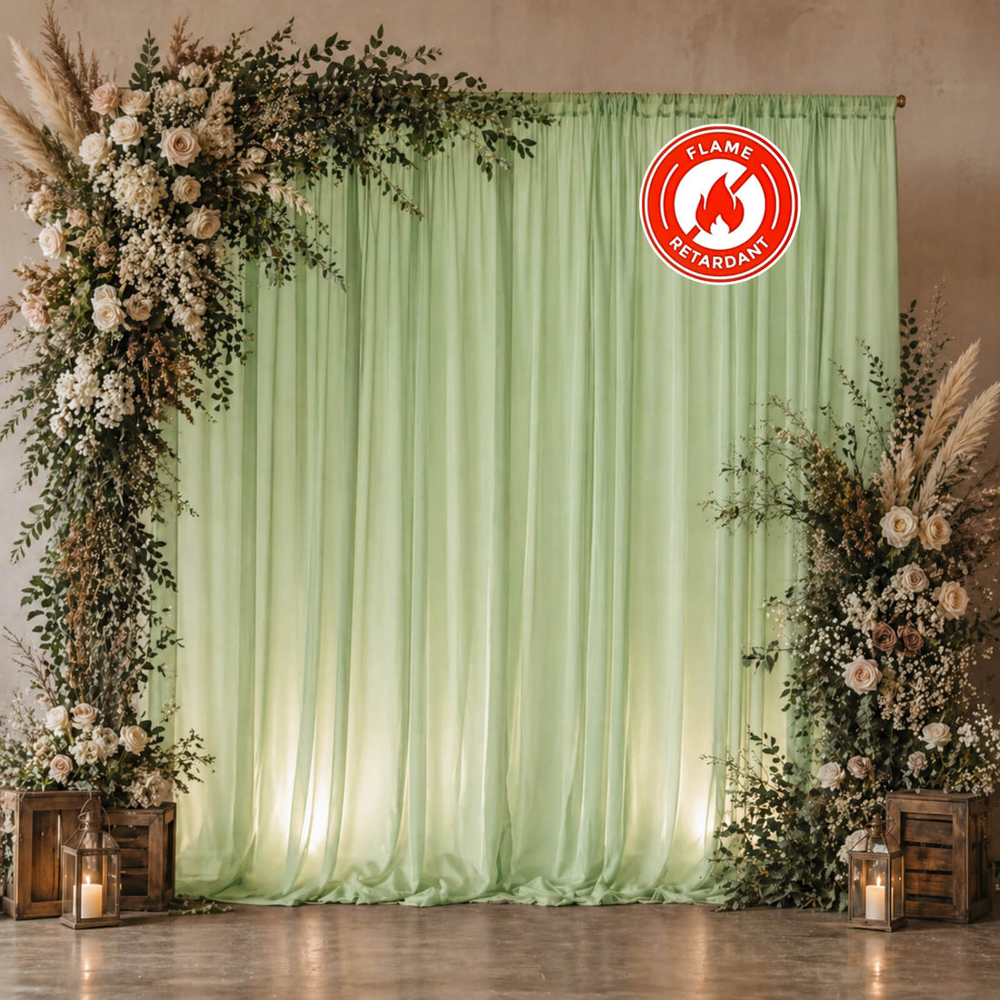 Elegant floral wedding backdrop with green drapes and candle lanterns, flame retardant