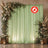 Elegant floral wedding backdrop with green drapes and candle lanterns, flame retardant