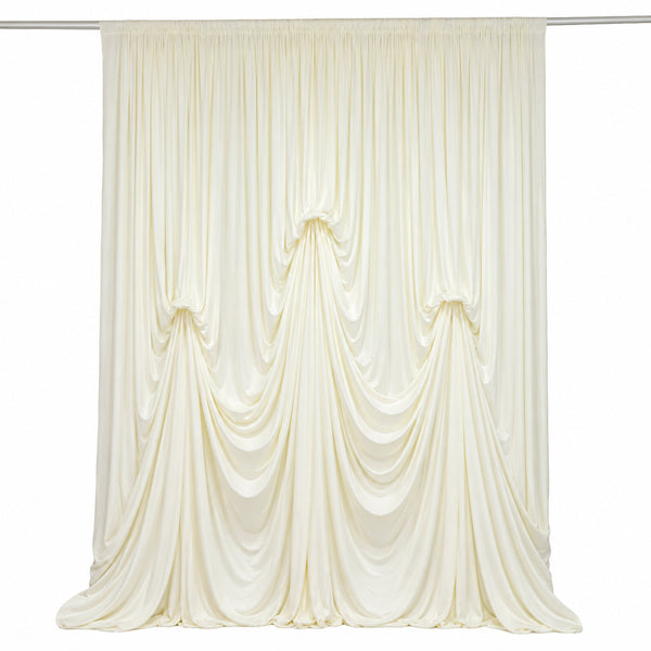 Elegant ivory draped curtain backdrop with soft gathered folds
