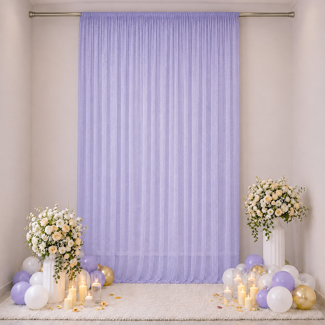 Elegant pastel lavender party backdrop with flowers, balloons, and candles
