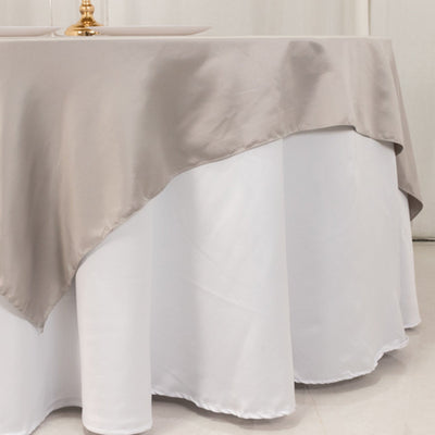 Elegant beige tablecloth draped over a white table