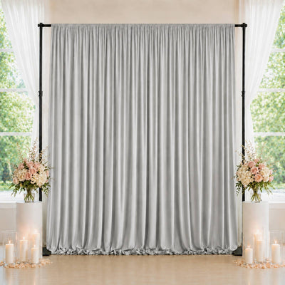 Elegant silver backdrop curtain with floral candle wedding decor by windows