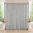 Elegant silver backdrop curtain with floral candle wedding decor by windows