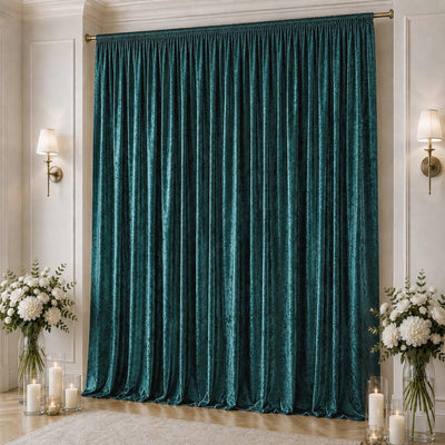 Elegant teal velvet curtains in a classic living room with floral decor