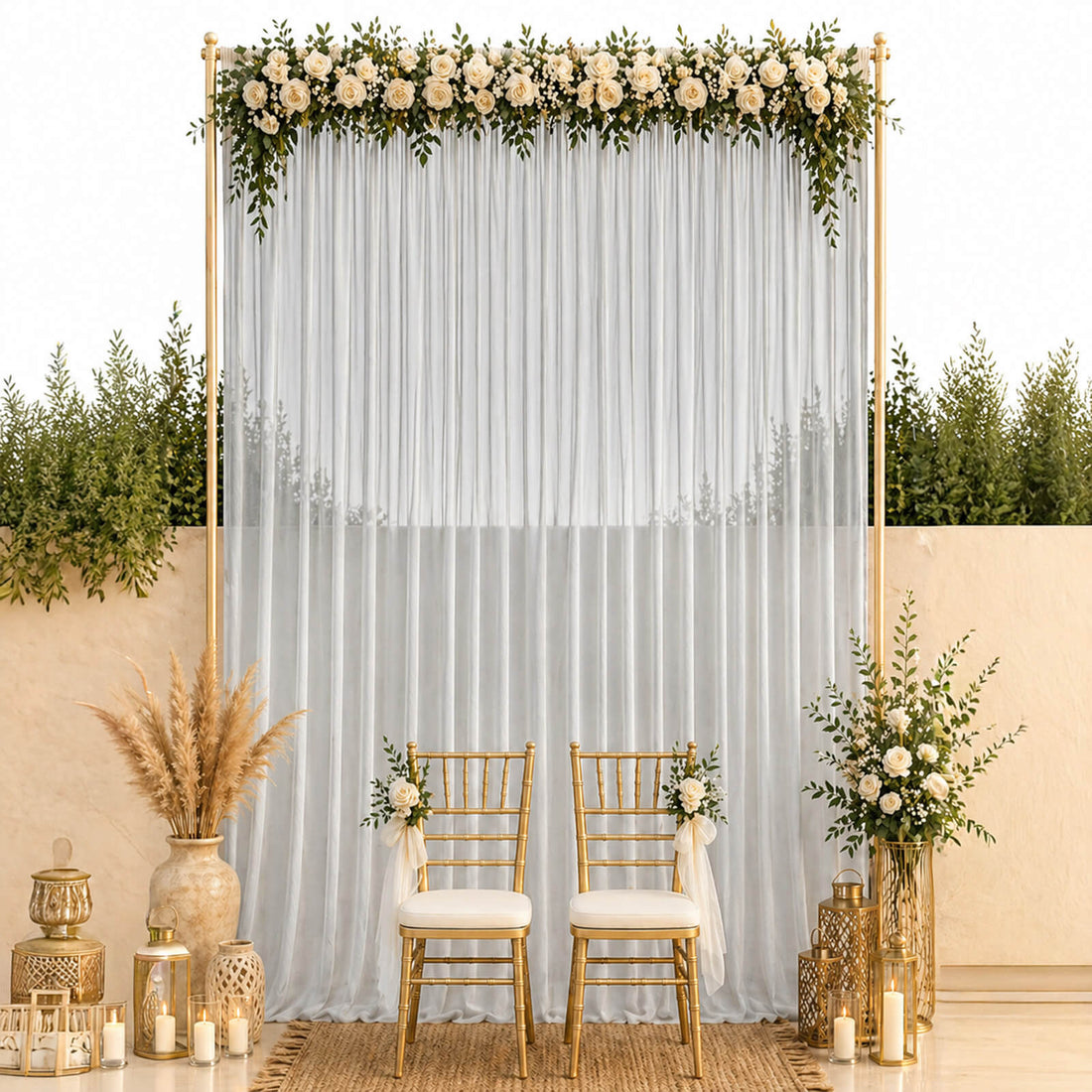 Elegant wedding backdrop with white roses, gold chairs, and sheer drapes