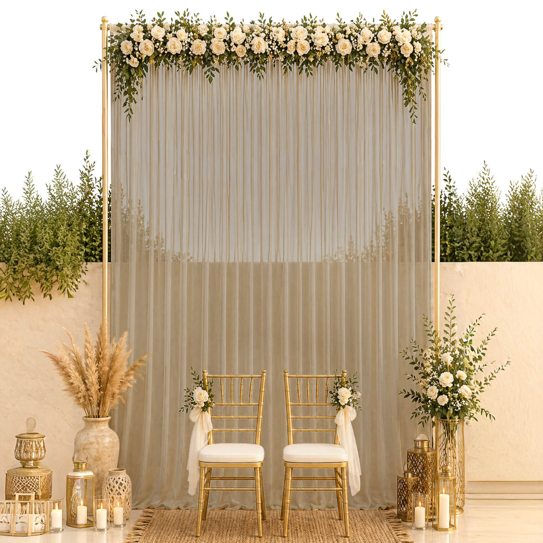Elegant wedding ceremony backdrop with gold chairs, floral arch, and candles